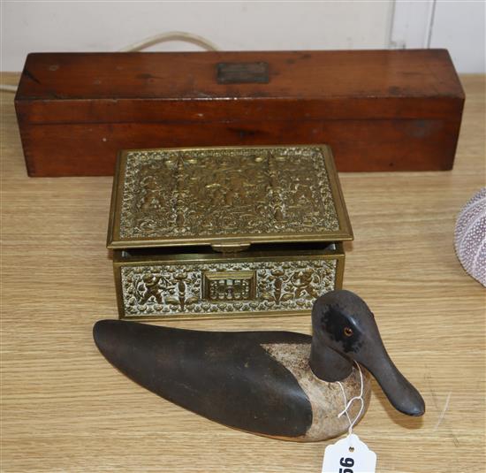 A decoy duck, a cast brass box and Stanley boxed French curve templates